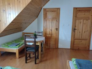 Postel nebo postele na pokoji v ubytování Jurajska Chata