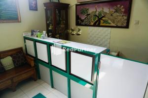 Foto sihtkohas Tlekung asuva majutusasutuse Griya Imafa Inn RedPartner near Jatim Park 2 galeriist