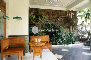 Foto sihtkohas Tlekung asuva majutusasutuse Griya Imafa Inn RedPartner near Jatim Park 2 galeriist