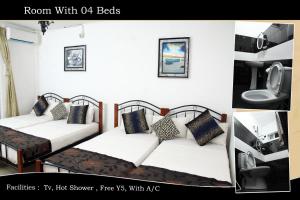 Letto o letti in una camera di Charlton Kandy City Rest
