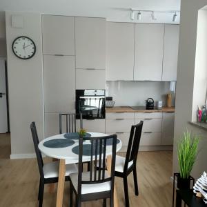 Kuchyňa alebo kuchynka v ubytovaní Apartament PERŁA POŁUDNIA