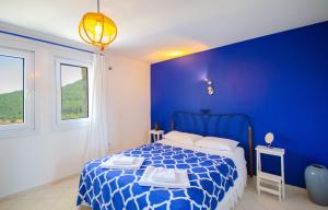 Postel nebo postele na pokoji v ubytování Stone clad Villa La Maison P