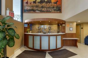 a lobby with a circular counter in a building at Comfort Inn Brooklyn in Brooklyn