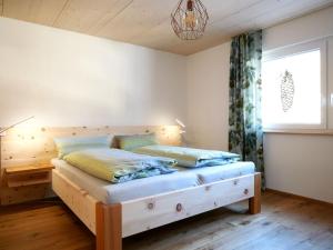 מיטה או מיטות בחדר ב-Oskar's Chalets