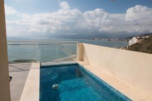 Bazén v ubytování MONTE AZUL Faro de Cullera nebo v jeho okolí