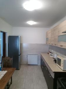 Kuchyň nebo kuchyňský kout v ubytování Apartman Marko