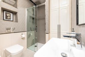 Kúpeľňa v ubytovaní Fort Wola 12A by Homeprime