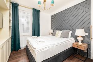 Posteľ alebo postele v izbe v ubytovaní Fort Wola 12A by Homeprime