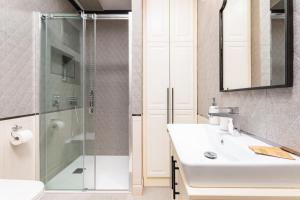 Kúpeľňa v ubytovaní Fort Wola 12A by Homeprime