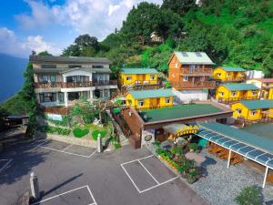 an aerial view of a resort with a parking lot at Emmanuel Farm House in Renai