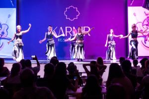 a group of women performing on a stage at Karmir Resort & Spa - Ultra All Inclusive in Kemer