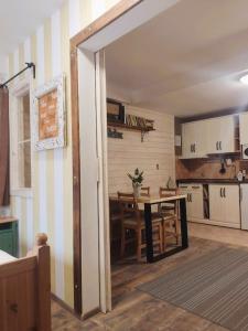 Kuchyň nebo kuchyňský kout v ubytování Horský Apartmán Tatran