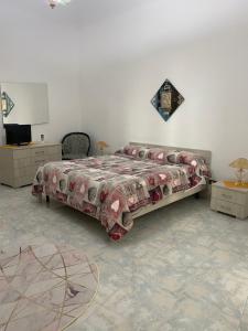 A bed or beds in a room at Casa vacanza da Paola