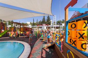 a group of children playing in a water park at Karmir Resort & Spa - Ultra All Inclusive in Kemer