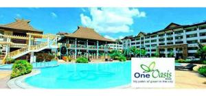 Bazén v ubytování ONE OASIS a1 SM MALL DAVAO FREE POOL WIFI nebo v jeho okolí