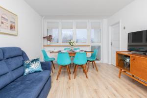 Televízia a/alebo spoločenská miestnosť v ubytovaní City Center Apartment Gdynia by Noclegi Renters
