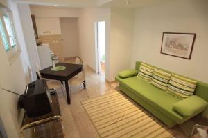 Posedenie v ubytovaní Apartment in Podgora with sea view, terrace, air conditioning, WiFi 849-2