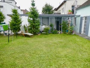 Vonkajšia záhrada v ubytovaní Cozy Apartment Steyr Mitte, ruhig, Parkplatz, Terasse, 2 Schlafzimmer, WLAN