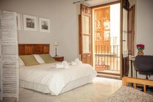 Ένα ή περισσότερα κρεβάτια σε δωμάτιο στο Alh Patio Apartamentos