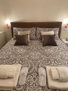 Кровать или кровати в номере Casa Vacanze: Eureka