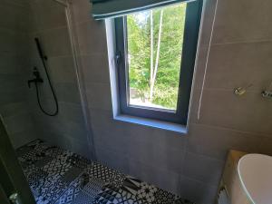 Koupelna v ubytování Chaty Tri vydry + 26 fotografií
