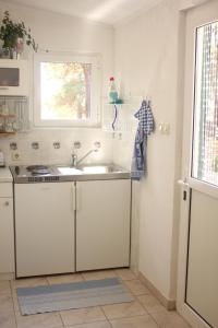Kúpeľňa v ubytovaní Studio apartment in Veli Rat with sea view, balcony, washing machine 882-1