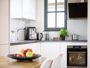 Köök või kööginurk majutusasutuses Reetland am Meer - Superior Reetdachvilla mit 2 Schlafzimmern E01