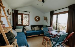 Ein Sitzbereich in der Unterkunft Eco-lodge Villa Epicurea