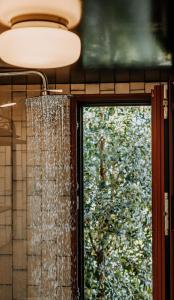 Ett badrum på Eco-lodge Villa Epicurea
