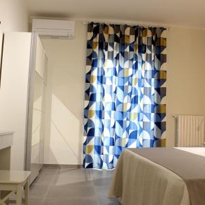 A bed or beds in a room at B&B m’ama non m’ama