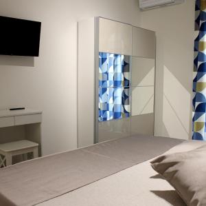 A bed or beds in a room at B&B m’ama non m’ama
