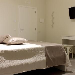 A bed or beds in a room at B&B m’ama non m’ama