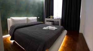 Ένα ή περισσότερα κρεβάτια σε δωμάτιο στο Moro 34