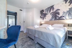 Postel nebo postele na pokoji v ubytování Villa Solaris
