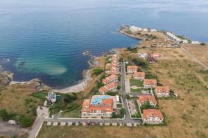an aerial view of a resort next to the water at Hotel Lalov Egrek in Lozenets