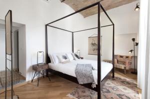 Postel nebo postele na pokoji v ubytování Residenza Flavia