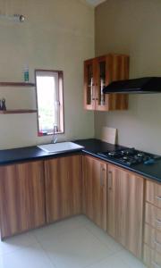 Kuchyň nebo kuchyňský kout v ubytování Colonial Cocoon Studio and Apartement