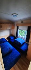 Un pat sau paturi într-o cameră la RBR 753 - Beach Resort Kamperland