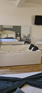 A bed or beds in a room at B&B Emozioni e Relax