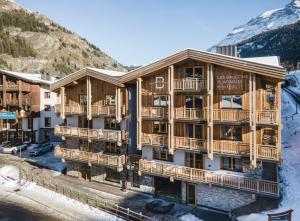 Les Balcons Platinium Val Cenis saat musim dingin