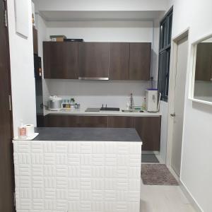 A kitchen or kitchenette at Nice stay in heart of Kota Bharu@Troika,free Wifi.