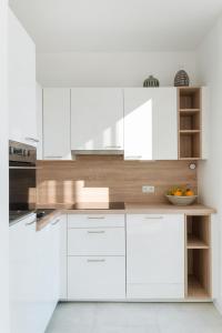Kuchyň nebo kuchyňský kout v ubytování Sophienne Apartments