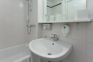 Koupelna v ubytování acom-Hotel Berlin Kurfürstendamm + 20 fotografií