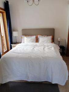 Voodi või voodid majutusasutuse Bella Vista Lodge toas