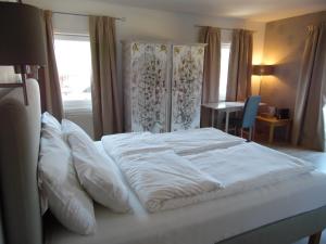 Voodi või voodid majutusasutuse Bella Vista Lodge toas