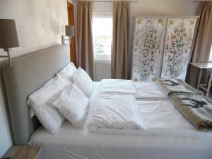 Voodi või voodid majutusasutuse Bella Vista Lodge toas