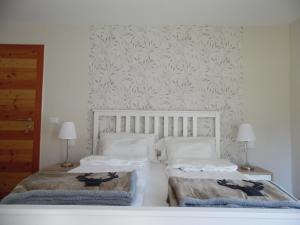 Voodi või voodid majutusasutuse Bella Vista Lodge toas