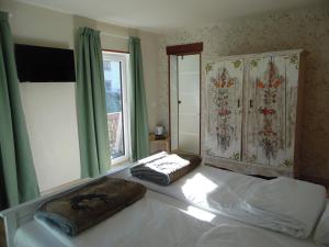 Voodi või voodid majutusasutuse Bella Vista Lodge toas