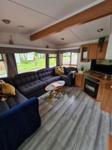A seating area at Unique Caravan with Outdoor Space