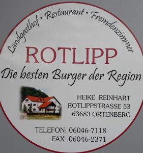 Ortenberg的住宿－Landgasthof Rotlipp Gästezimmer，一座红色和白色的建筑的标志